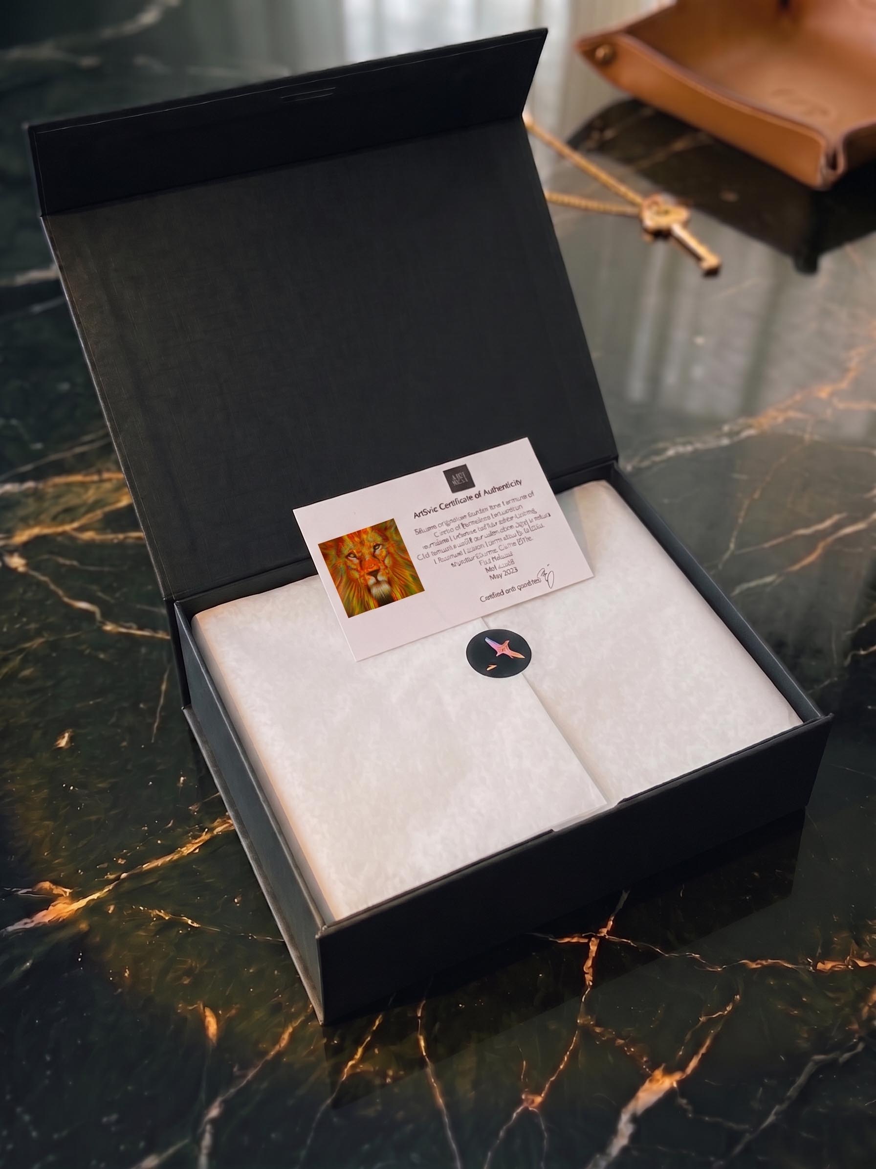 A boxed silk artwork prepared for inspection before any mounting decision